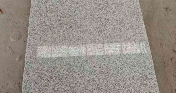 本溪芝麻白光面毛板